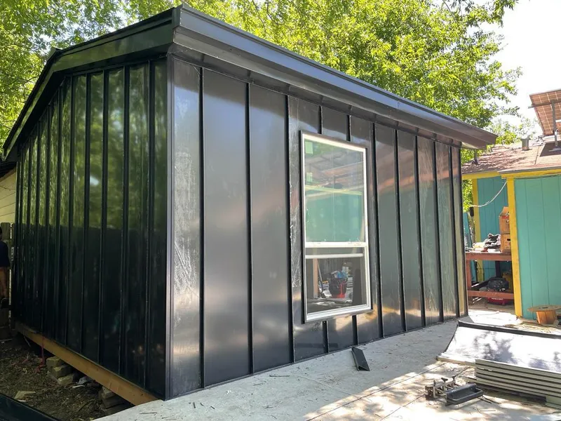 Black standing seam metal wall panels for Roof Inspection in Wimauma